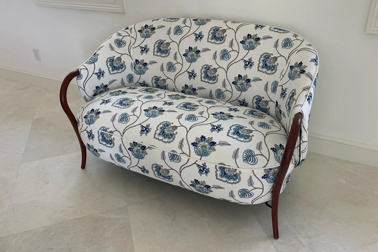 A couch with floral pattern on it