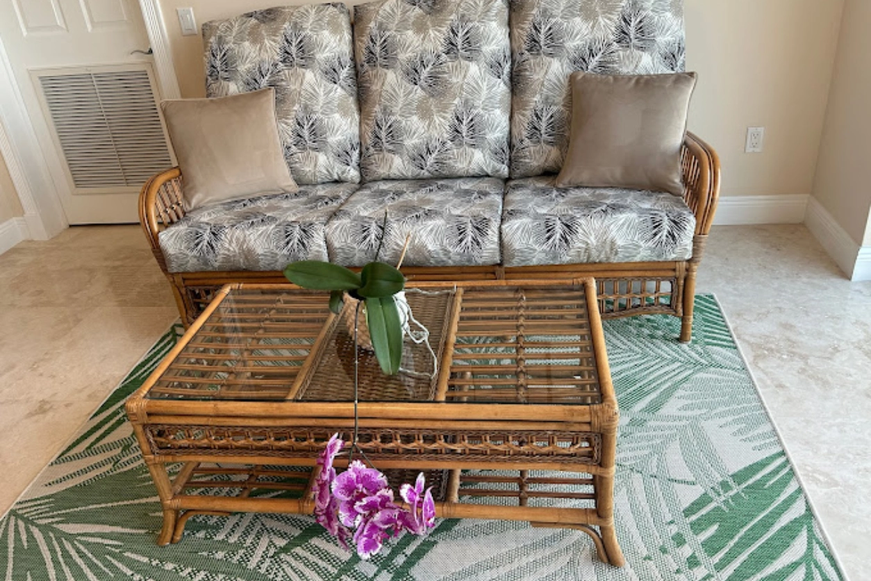 A couch and coffee table in the living room.