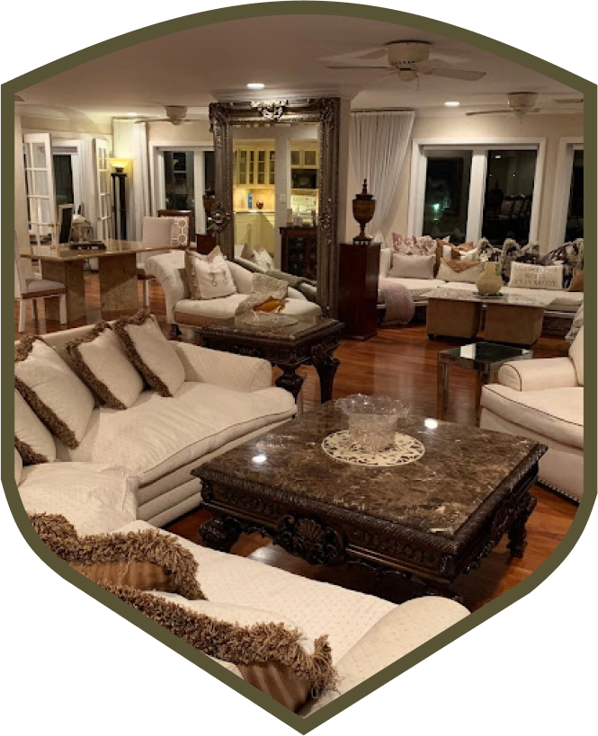 A living room filled with furniture and a table.